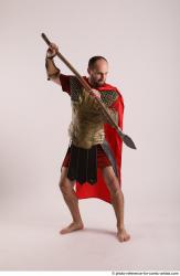 Man Adult Average White Fighting with spear Standing poses Casual